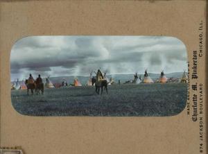 Siksika camp with horses